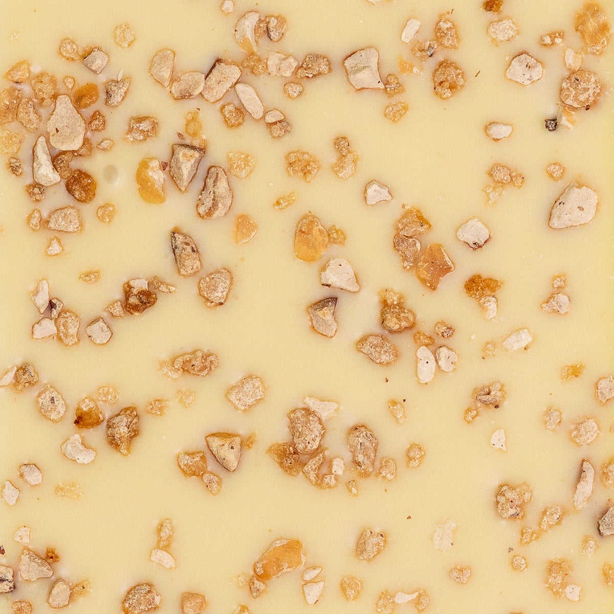 TABLETTE DE CHOCOLAT BLANC YUZU ET GRAINS DE NOISETTES GRILLÉES